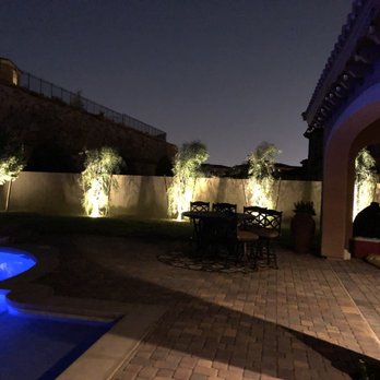 Land View Landscape - a pool and patio area at night - Landscaping Near Me - Las Vegas, Nevada Land View Landscape - a pool and patio area at night - Landscaping Near Me - Las Vegas, Nevada