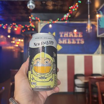 Three Sheets - a person holding a can of beer - American Near Me - New Haven, Connecticut