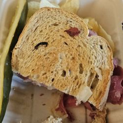Grayson Highlands General Store & Inn - Ruben Sandwich with chips and a pickle spear.
