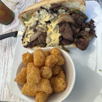 Rosie's Bar & Grill - Willy Cheesesteak with tater tot's - Gay Bars Near Me - Wilton Manors, Florida Rosie's Bar & Grill - Willy Cheesesteak with tater tot's - Gay Bars Near Me - Wilton Manors, Florida