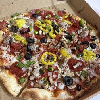 Fan Cave Pizzeria - 12" Deluxe Thin Crust - Pizza Near Me - Parsons, Tennessee Fan Cave Pizzeria - 12" Deluxe Thin Crust - Pizza Near Me - Parsons, Tennessee