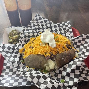 Uncle's BBQ - Loaded backed potato - Barbeque Near Me - Tomball, Texas Uncle's BBQ - Loaded backed potato - Barbeque Near Me - Tomball, Texas