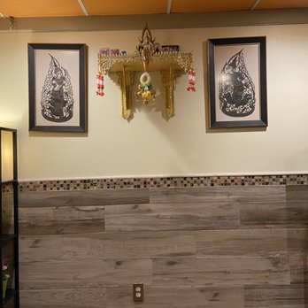 Lemon Grass Thai Kitchen - a wall with three framed pictures - Thai Near Me - Tampa, Florida Lemon Grass Thai Kitchen - a wall with three framed pictures - Thai Near Me - Tampa, Florida
