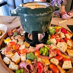 Bonnie's Bread & Butter - Classic Swiss cheese fondue with all of the goodies. Bread, vegetables and salami. Excellent!