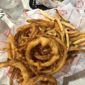 Cheeburger Cheeburger - Best Of Both Onion rings and fries basket - Burgers Near Me - Sanibel Island, Florida Cheeburger Cheeburger - Best Of Both Onion rings and fries basket - Burgers Near Me - Sanibel Island, Florida