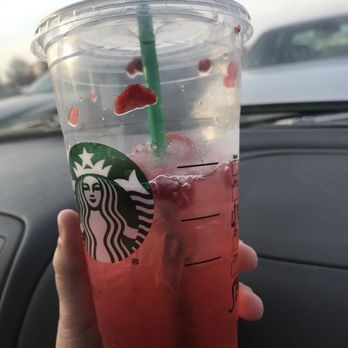 Starbucks - His first time trying Strawberry Acai and he loves it. Personally, I hate it!! - Coffee & Tea Near Me - Shelby Charter Twp, Michigan