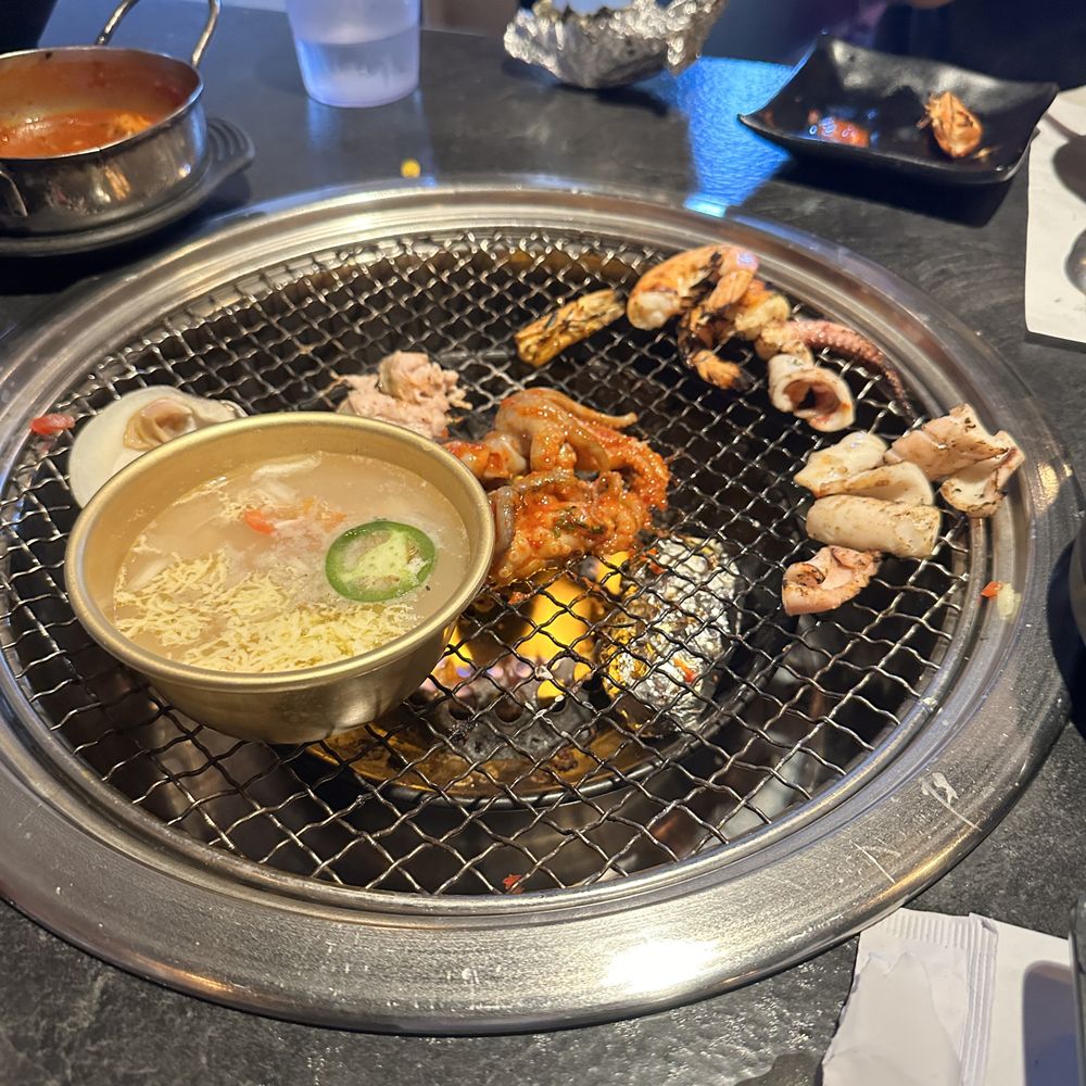 Burnin' Shell - Bay scallop soup, some shrimp, squid and octopus - Seafood Near Me - Los Angeles, California Burnin' Shell - Bay scallop soup, some shrimp, squid and octopus - Seafood Near Me - Los Angeles, California