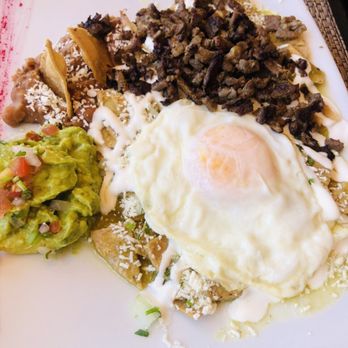 El Agasajo - Chilaquiles with steak--over easy eggs - Bars Near Me - Cabo San Lucas, BCS El Agasajo - Chilaquiles with steak--over easy eggs - Bars Near Me - Cabo San Lucas, BCS