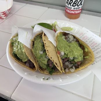 Tacos Frontera - Tacos de azada  with hand  made tortillas fresh guacamole chopped cilantro y cebolla served with lime radish and cucumber - Tacos Near Me - Houston, Texas