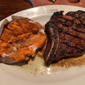 LongHorn Steakhouse - Outlaw Ribeye and sweet potato with butter and brown sugar - Steakhouses Near Me - Manchester, Connecticut