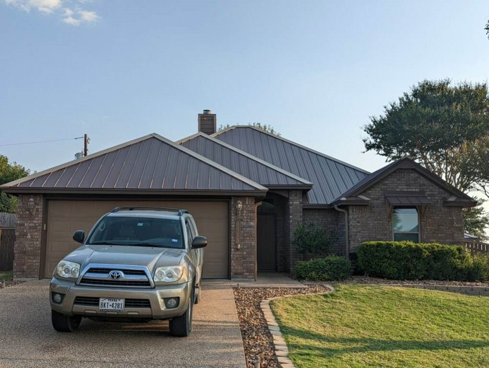 Slide of T2K Roofing