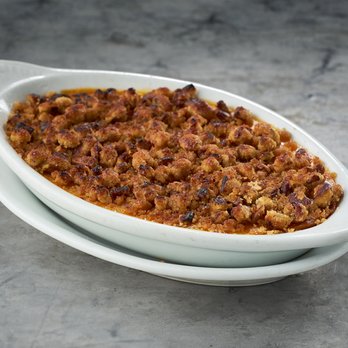 Ruth's Chris Steak House - a casserole dish on a plate - Steakhouses Near Me - Austin, Texas Ruth's Chris Steak House - a casserole dish on a plate - Steakhouses Near Me - Austin, Texas