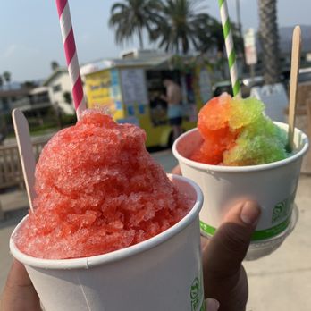 Penelope's Sno Balls at the Beach - Tiger's blood shaved ice and rainbow shaved ice both with ice cream on the bottom - Hot Dogs Near Me - Carpinteria, California Penelope's Sno Balls at the Beach - Tiger's blood shaved ice and rainbow shaved ice both with ice cream on the bottom - Hot Dogs Near Me - Carpinteria, California