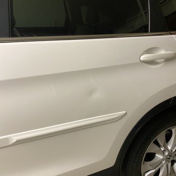 Valley Dents - Dented driver-side back seat door. - Mobile Dent Repair Near Me