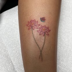 Circle Of Fire Tattoo - Water lillies with lady bug.