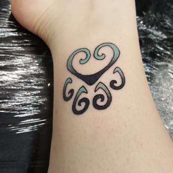 Tribe Tattoo - Love my teal and black paw print. Thanks Teddy Nigels. - Tattoo Near Me - Denver, Colorado