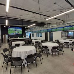 Omaha Sports & Games - Relax and enjoy dining in our upstairs lounge while watching sports or a company presentation across our quad screen TV!