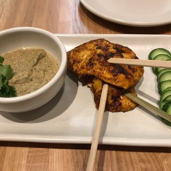 True Food Kitchen - Seared Chicken Satay** with pumpkin seed salsa and Persian cucumber - New American Near Me - Boca Raton, Florida