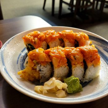 Hiro Sushi - a plate of sushi and a bowl of salad - Japanese Near Me - Burnaby, British Columbia