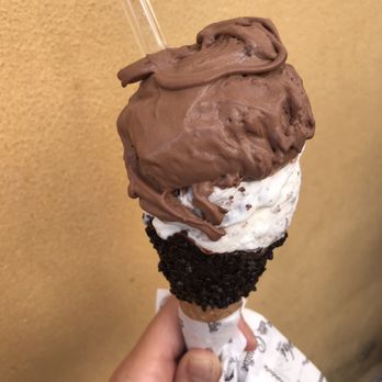 Venchi - Delicious! Chocolate 75% and Milk with Chocolate Chips in a chocolate dipped cone. - Ice Cream & Frozen Yogurt Near Me - Rome, RM Venchi - Delicious! Chocolate 75% and Milk with Chocolate Chips in a chocolate dipped cone. - Ice Cream & Frozen Yogurt Near Me - Rome, RM