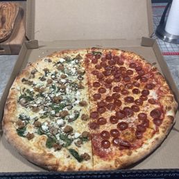 Half sausage party and half pepperoni Half sausage party and half pepperoni