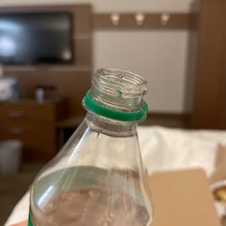 Domino's - Smudge almost looks like spit on the neck of the bottle