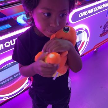 Gatcha - Little brother with a Charmander plush! - Arcades Near Me - Orlando, Florida