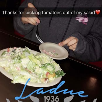Lester's - picking tomatoes out of salad - Burgers Near Me - St. Louis, Missouri Lester's - picking tomatoes out of salad - Burgers Near Me - St. Louis, Missouri