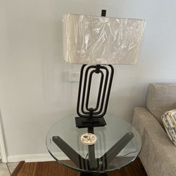 Only took 2 months to get it right. . Once lamp was on the glass table top. The lamp