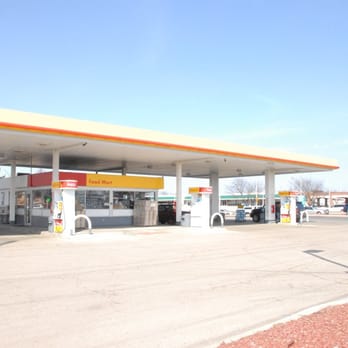 Shell Gas Station - a gas station in the middle of a parking lot - Gas Stations Near Me - Naperville, Illinois Shell Gas Station - a gas station in the middle of a parking lot - Gas Stations Near Me - Naperville, Illinois