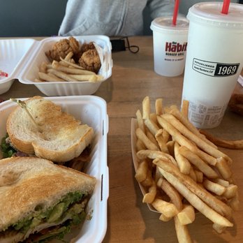 Habit Burger & Grill - Club chicken sandwich, side order of fries ana kids meal chicken tenders. - Burgers Near Me - Santa Maria, California Habit Burger & Grill - Club chicken sandwich, side order of fries ana kids meal chicken tenders. - Burgers Near Me - Santa Maria, California