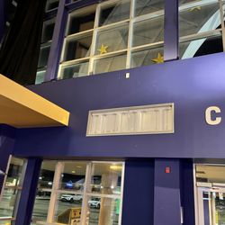 Cineplex Odeon Aurora - Missing exit graphic (since replaced by "The Movies Miss You Already"
