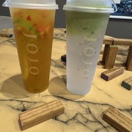 Matcha coconut water and summertime fruit tea . Matcha coconut water and summertime fruit tea .