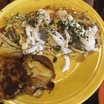 The Chalkboard Kitchen - Gyro omelet with potatoes, comes with pita bread too (not shown). - Breakfast & Brunch Near Me - South Haven, Michigan The Chalkboard Kitchen - Gyro omelet with potatoes, comes with pita bread too (not shown). - Breakfast & Brunch Near Me - South Haven, Michigan
