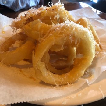 Bare Bones Steakhouse - These onion rings ARE A MUST!! Best I have had anywhere!! Drizzled in honey was delish!! - Steakhouses Near Me - Buford, Georgia