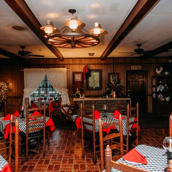 Daphne Lodge Restaurant - dining room with red tablecloths and black and white checkered tablecloths - New American Near Me - Cordele, Georgia