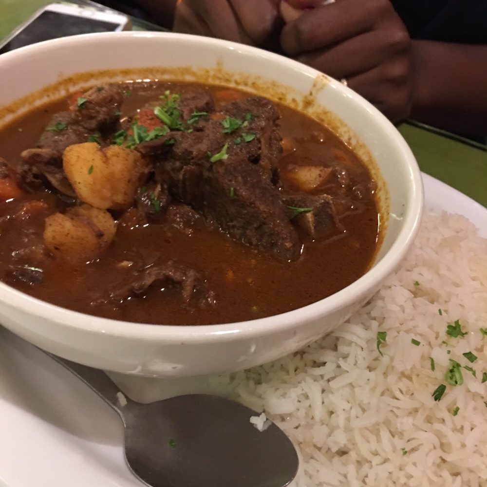 Jambo Cafe - Goat stew - Caribbean Near Me - Santa Fe, New Mexico Jambo Cafe - Goat stew - Caribbean Near Me - Santa Fe, New Mexico