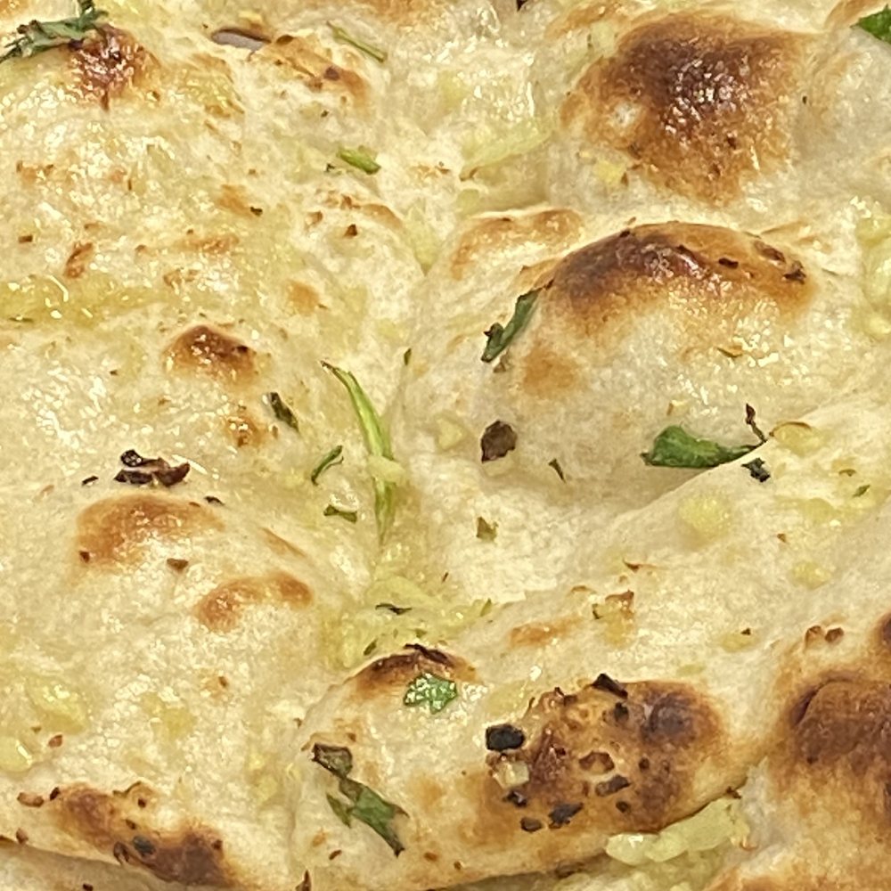 India Clay Oven - Garlic Naan - Indian Near Me - Branson, Missouri India Clay Oven - Garlic Naan - Indian Near Me - Branson, Missouri