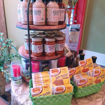 Olive Amelia - a display of various jars of food - Olive Oil Near Me - Amelia Island, Florida Olive Amelia - a display of various jars of food - Olive Oil Near Me - Amelia Island, Florida