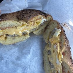 New York Bagel Company - Sausage, egg, and cheese (with ketchup) on an everything bagel