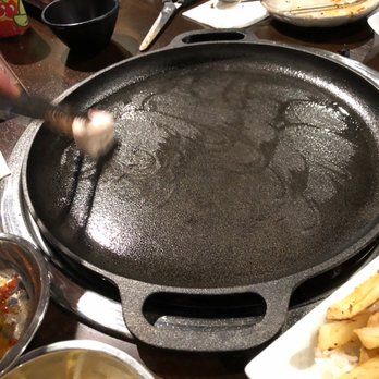 STE 101 - Greasing the pan with beef fat. Their signature move. - Korean Near Me - Los Angeles, California