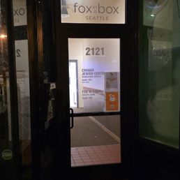 Front door showing address and logo.