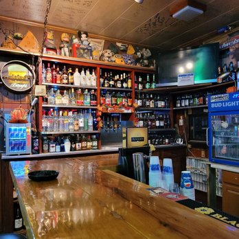 Silver Spur Bar & Lounge - a bar with a wooden bar top - Drive-Thru Bars Near Me - Ranchester, Wyoming Silver Spur Bar & Lounge - a bar with a wooden bar top - Drive-Thru Bars Near Me - Ranchester, Wyoming