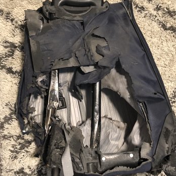 United Airlines - Flew from ORD to PHX and discovered my bag in what seemed to be a body bag on the other end. My bag looked like it had been shredded, burned - Airlines Near Me - Phoenix, Arizona
