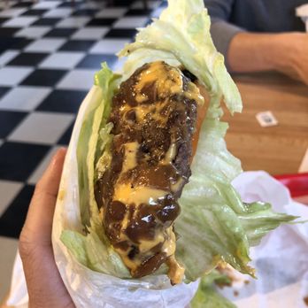 Get The Burger - Lettuce wrapped director. Observe the medley of meat cheese and onions. - Burgers Near Me - Big Bear Lake, California Get The Burger - Lettuce wrapped director. Observe the medley of meat cheese and onions. - Burgers Near Me - Big Bear Lake, California