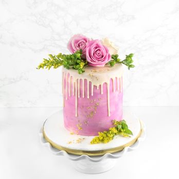 Valentina's Sweet Treats - a pink drip cake with pink roses on top - Desserts Near Me Valentina's Sweet Treats - a pink drip cake with pink roses on top - Desserts Near Me