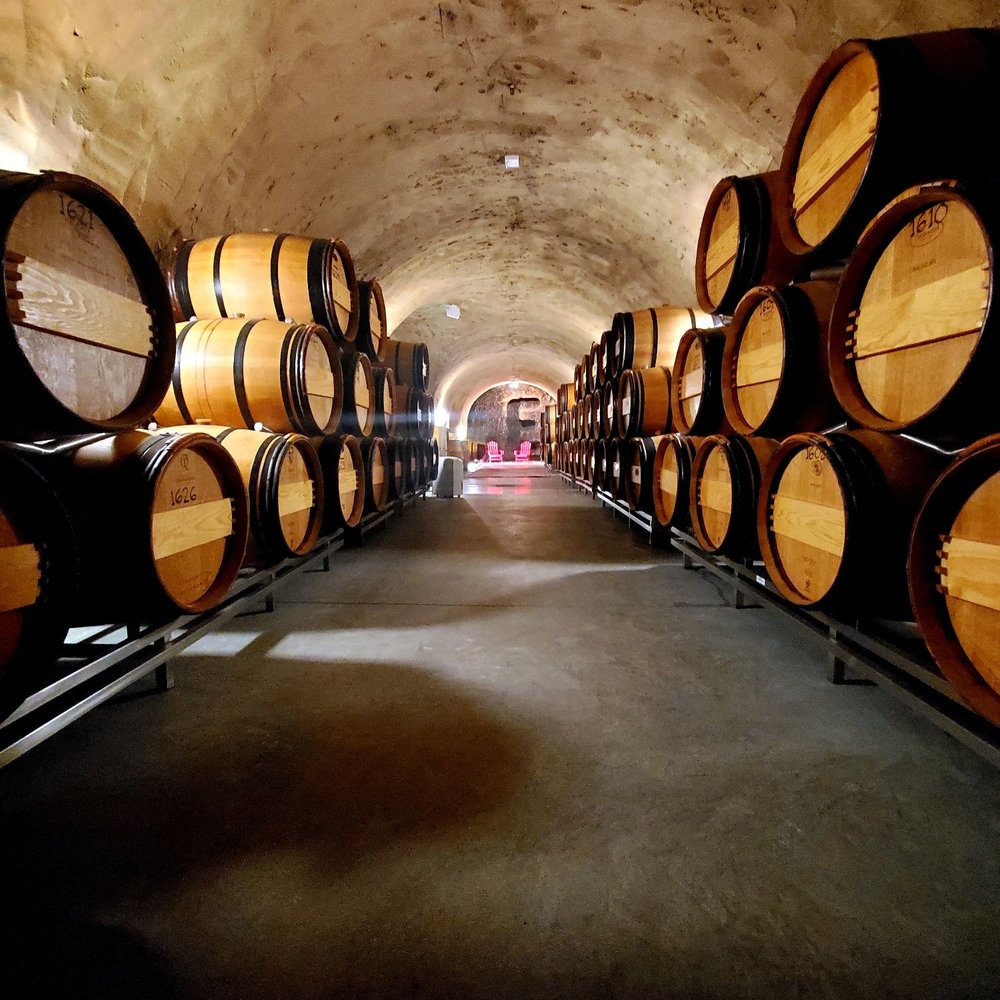 Tom Eddy Winery - barrels in a wine cellar - Wineries Near Me - Calistoga, California Tom Eddy Winery - barrels in a wine cellar - Wineries Near Me - Calistoga, California