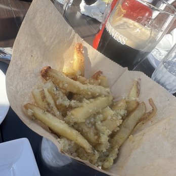 Hennessey's Tavern - Garlic Parm Fries - Irish Pub Near Me - Manhattan Beach, California Hennessey's Tavern - Garlic Parm Fries - Irish Pub Near Me - Manhattan Beach, California