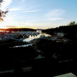 a view of the harbor at sunset a view of the harbor at sunset