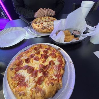 Mottzarellas - 10" Pepperoni pizza for her. 10" The Banger pizza for me. Plus an order of Pizza Logs. - Desserts Near Me - Granite Quarry, North Carolina